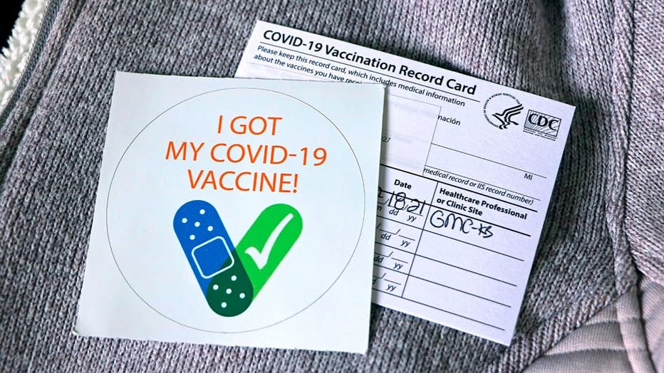 Covid-19 vaccination notice and vaccination confirmation card