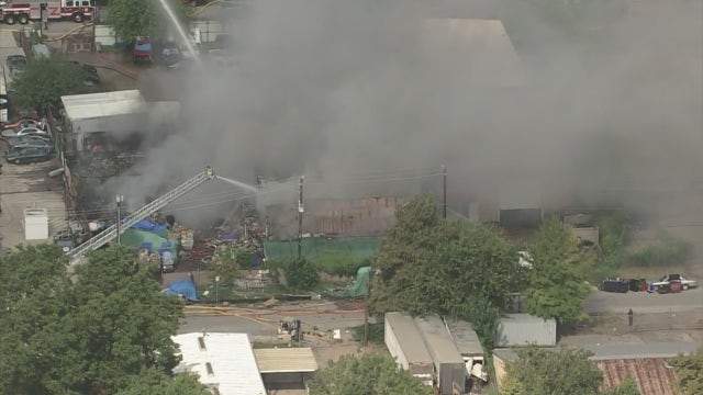 Firefighters battle 3-alarm warehouse fire in west Houston