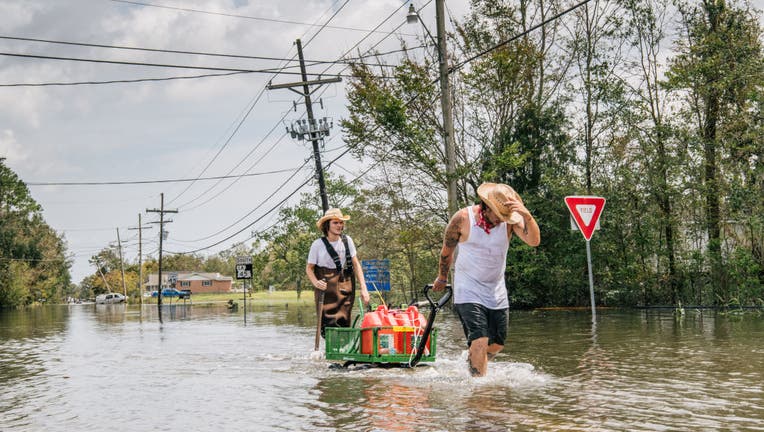 Electricity was restored Wednesday for some customers in Eastern New Orleans after Ida, while hundreds of thousands still remain with power and water shortages.