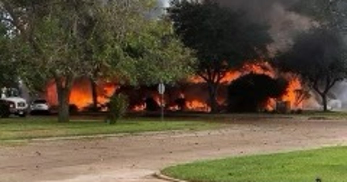 Officials working to put out flames at Bay City funeral home | FOX 26