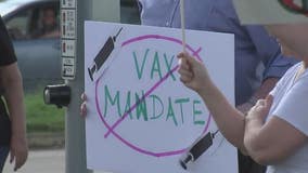 NASA employees gather outside campus Tuesday in opposition to federal vaccine mandate