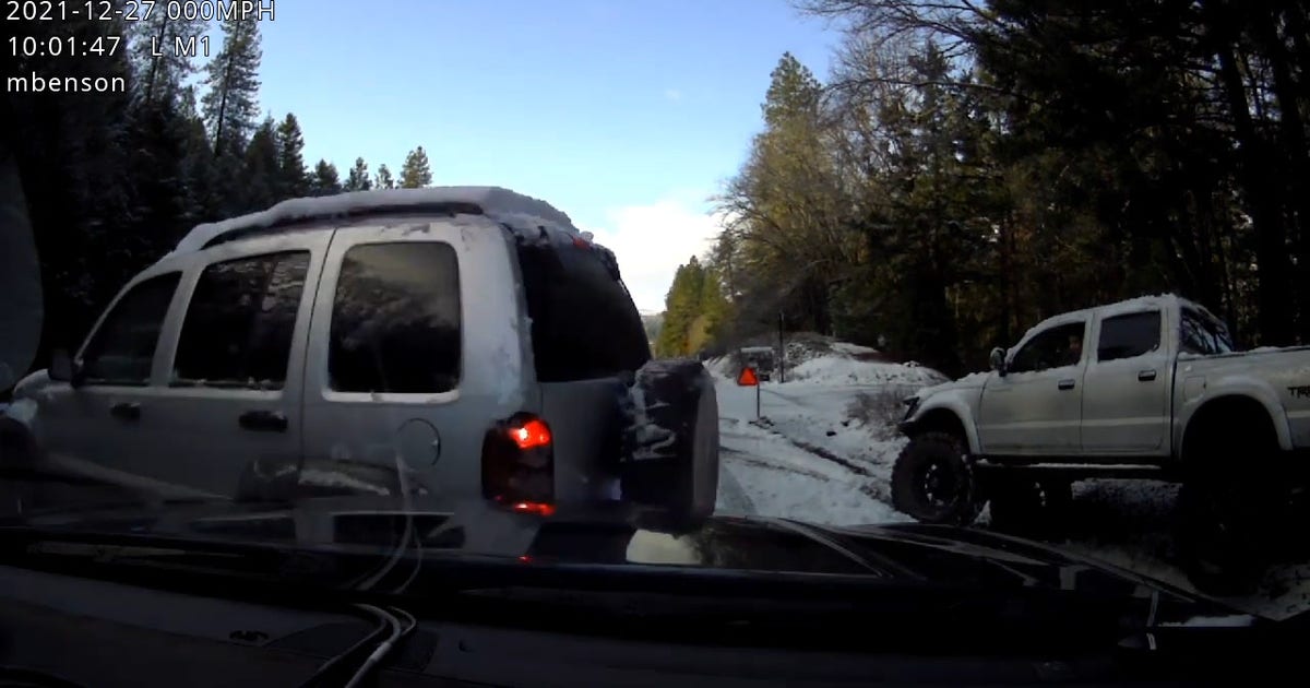 Video shows SUV plow into Oregon police car after sliding on black ice ...
