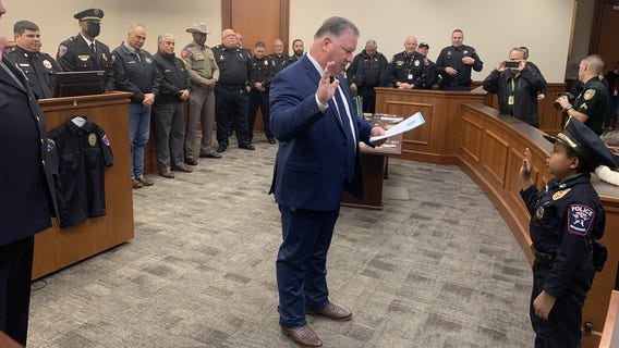 Houston boy, 10, with terminal cancer sworn-in at Galveston County ceremony