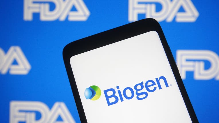 In this photo illustration the Biogen logo of a