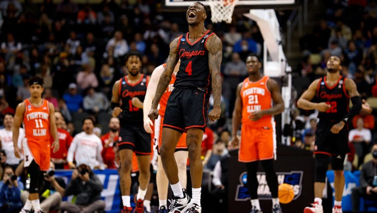 Taze Moore #4 of the Houston Cougars reacts after drawing a foul during the game against the Illinois Fighting Illini during the second round of the 2022 NCAA Men's Basketball Tournament at PPG PAINTS Arena on March 20, 2022 in Pittsburgh, Pennsylvania. (Photo by Kirk Irwin/Getty Images)