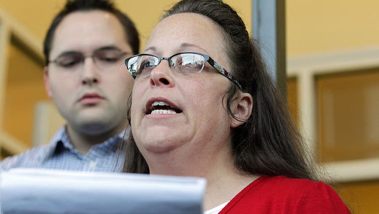 Kentucky county clerk says she won't interfere with gay-marriage licenses