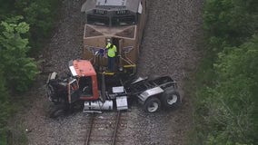 Train crashes into 18-wheeler leaving truck driver in critical condition