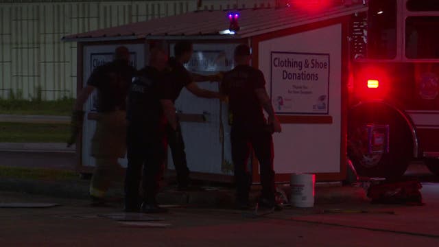 Houston firefighters rescue woman trapped in clothing donation box