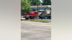 Off-duty officer shoots at suspected robbers outside Chase Bank, security guard hospitalized