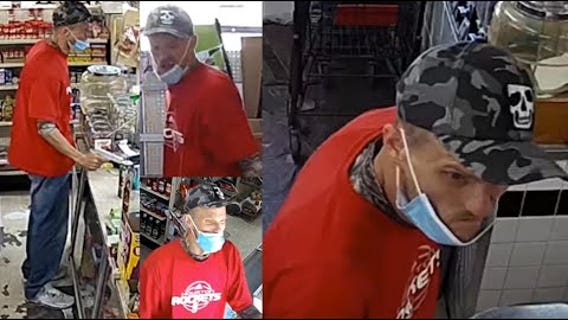 Video: Armed robber seen 'freaking out' after clerk presses panic button