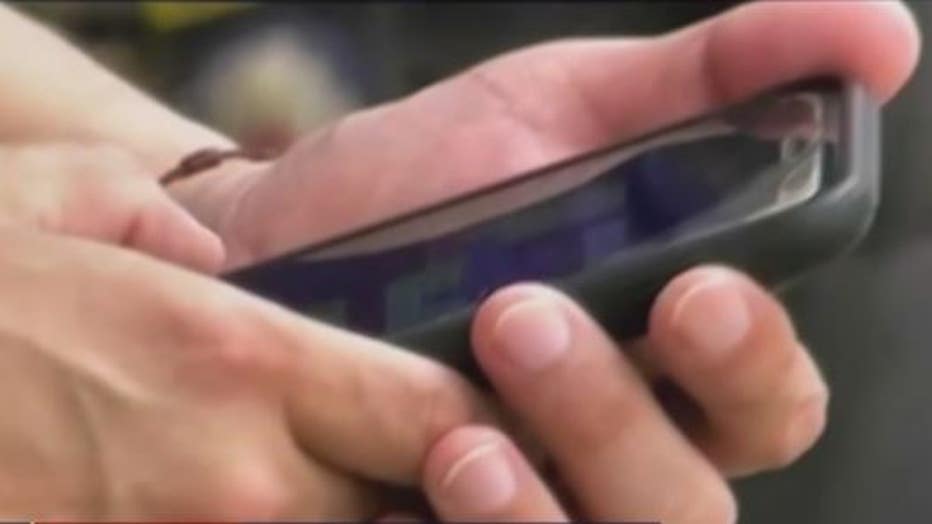 Man holding cell phone