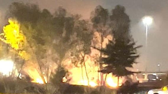 Grass fire puts stop to firework show at Cypress church