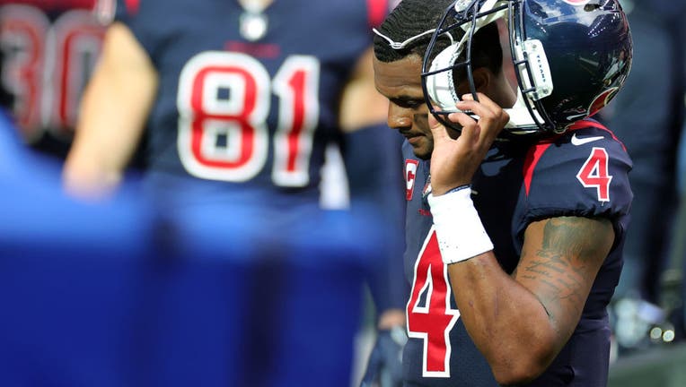 Quarterback Deshaun Watson #4 of the Houston Texans walks off the field