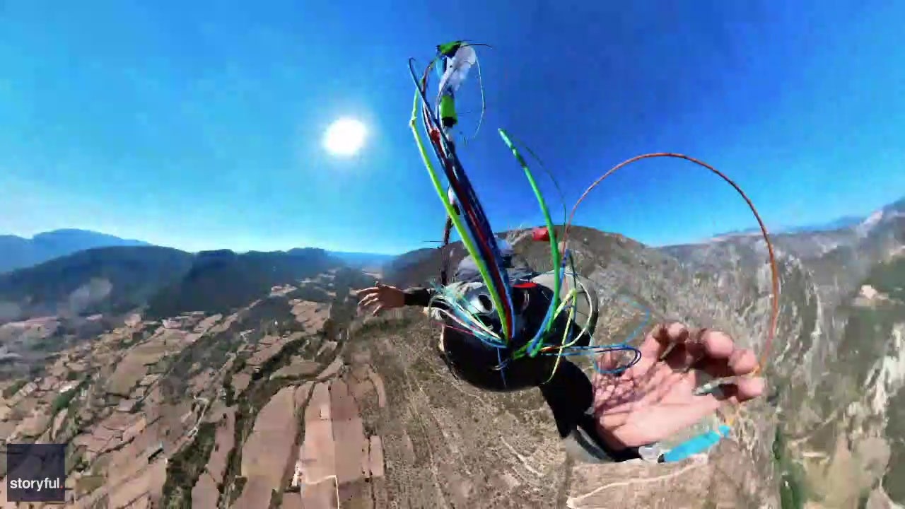 Video Paraglider barely avoids death after parachute gets tangled, backup doesnt open