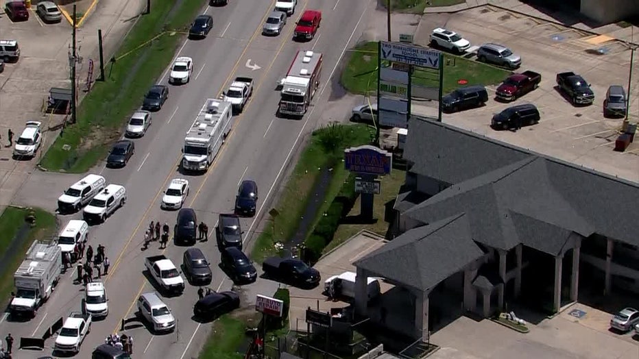 wide aerial footage of where a wanted man was shot, killed by Harris County law enforcement