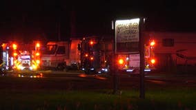Firefighter hospitalized following 2-alarm fire at storage center in Spring