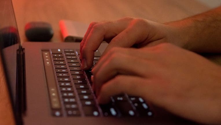 Woman Watching Porn On Computer - Scammers claim watching porn caused your computer to get hacked, BBB warns