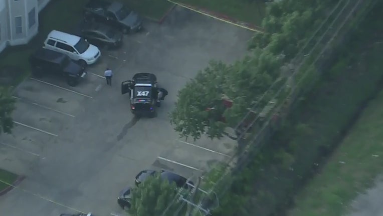 Houston police investigate a shooting on Village Way.