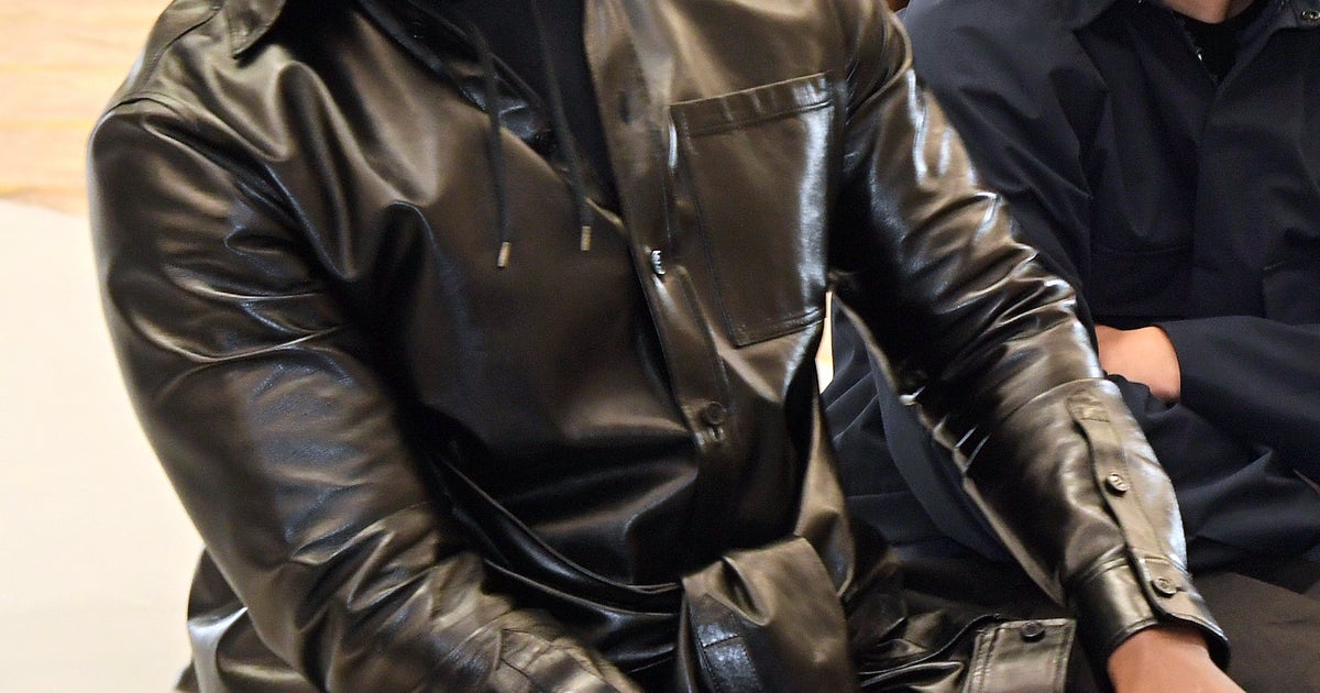 Kanye West wearing White Lives Matter shirt during his Yeezy show