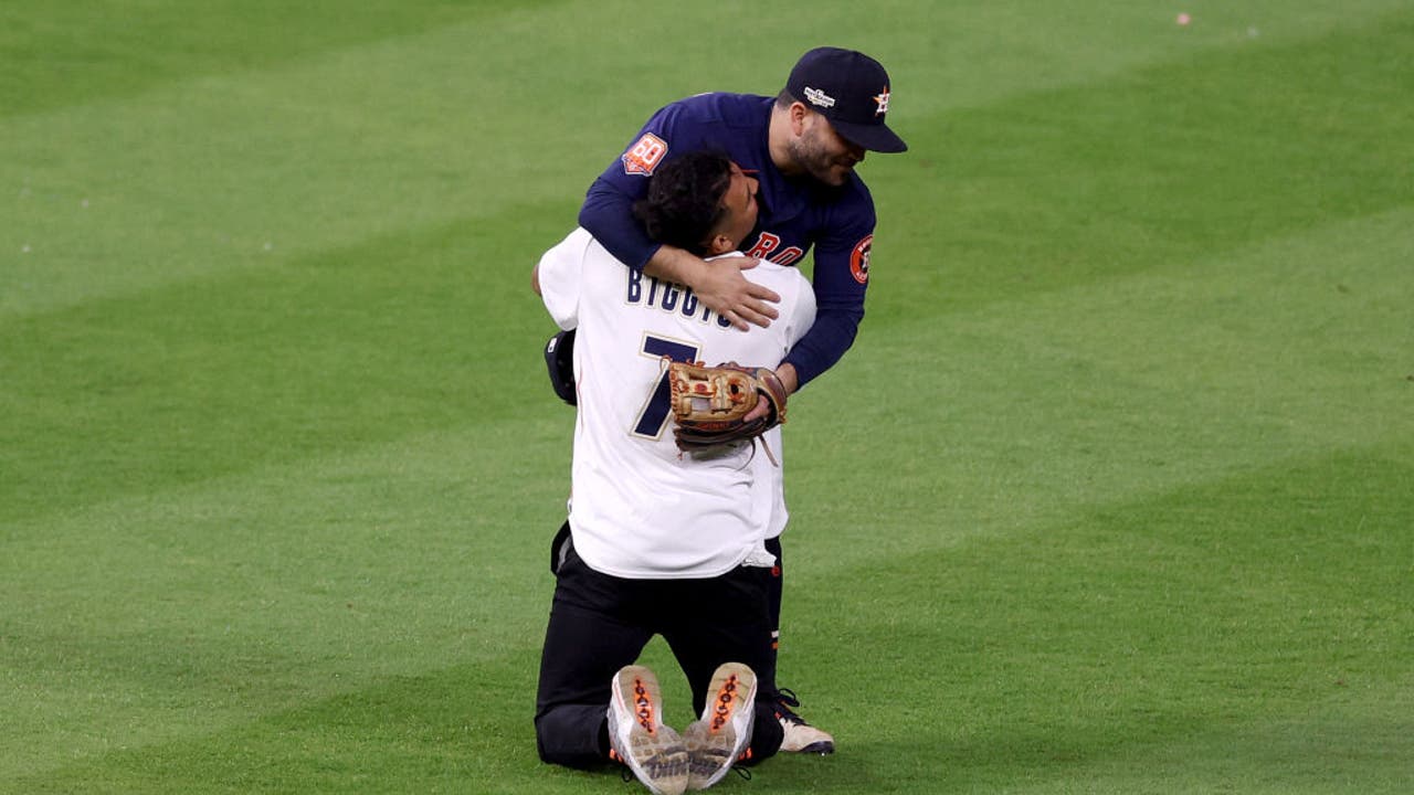 Video: Fan runs onto field, hugs Houston Astros' Jose Altuve