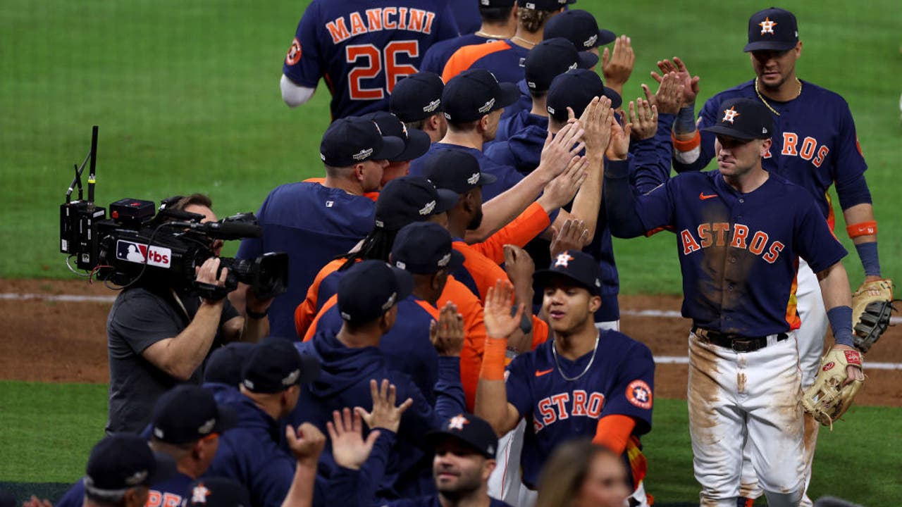 Astros fan runs on field and hugs Jose Altuve during ALCS
