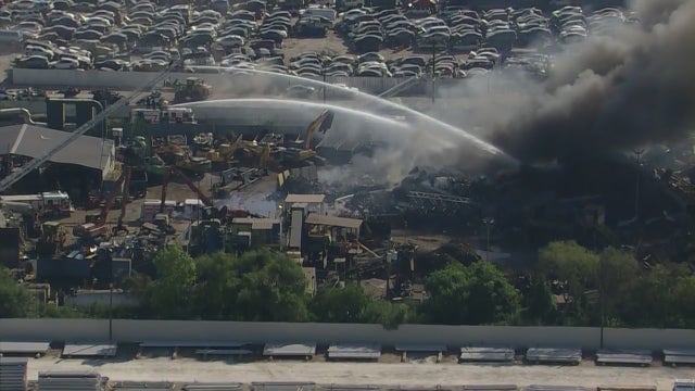 Heavy smoke rises from fire on Holmes Rd in Houston