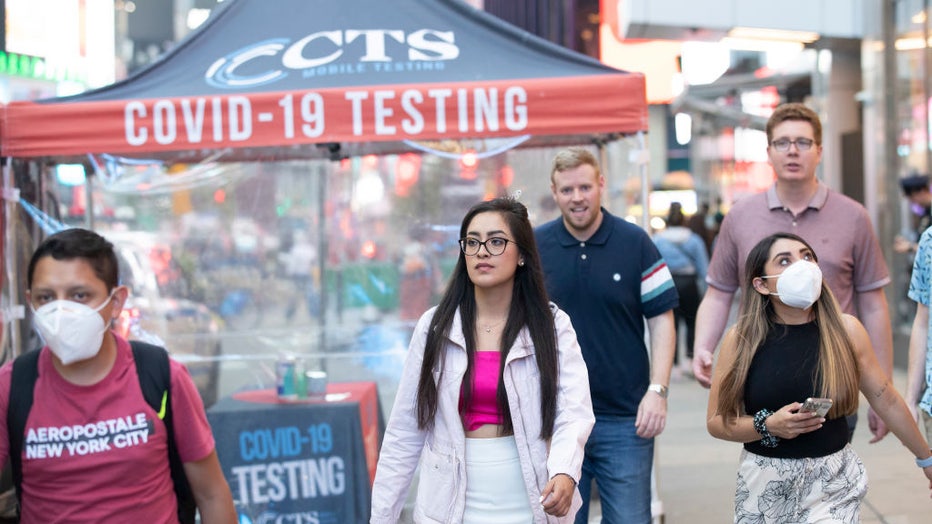 People-walk-past-testing-site-in-NY.jpg