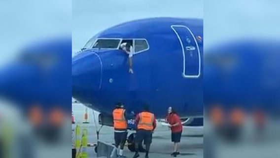 Southwest Airlines pilot hangs from window to retrieve passenger’s lost phone