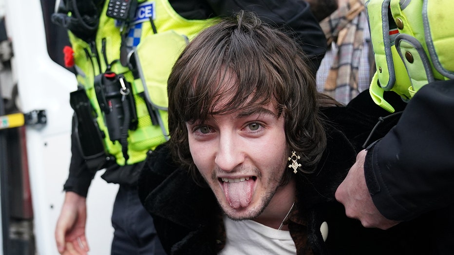 protester-sticks-tounge-out.jpg