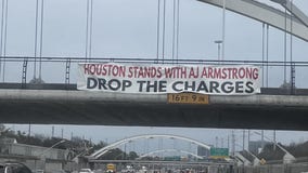 AJ Armstrong case: 'Drop the charges' banner goes up across U.S. 59 in Houston
