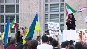 Houston Iranian, Ukrainian communities march downtown in show of unity