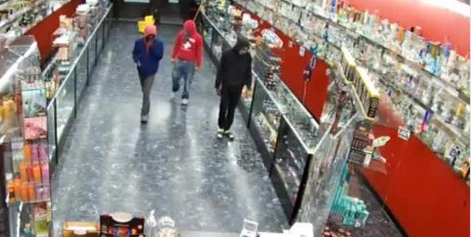 Police working to identify smoke shop robbery suspects