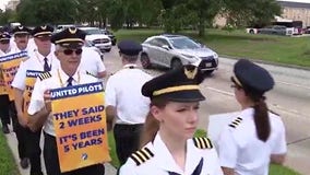 United Airlines pilots picket outside Houston's Bush Airport ahead of summer travel season