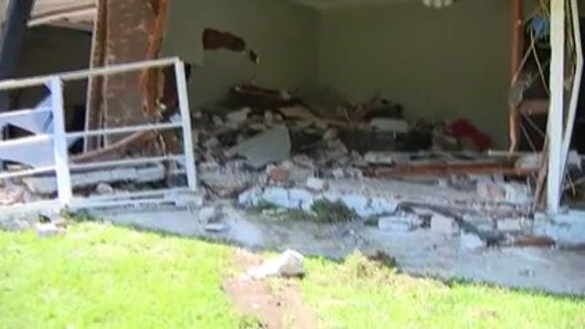 Unbelievable video captures aftermath of police chase ending with cop, suspects cars inside homes