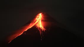 Most active Philippine volcano spews lava as evacuation orders loom