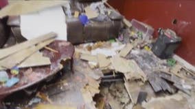 Natural gas tank explodes, damages business, lands inside Houston-area home