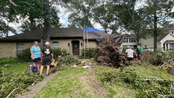 Trees topple onto homes and vehicles in Cypress during powerful storm system