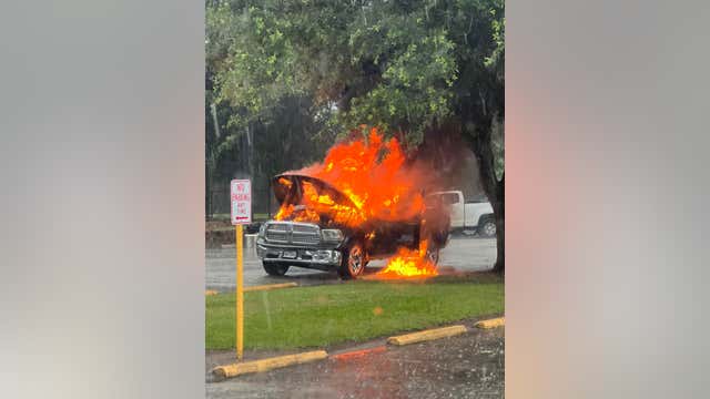 Vehicle bursts into flames after being struck by lightning in Harris Co.