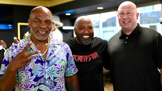 Pro boxer Mike Tyson visits Bun-B's Trill Burgers in Houston