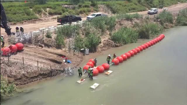 Justice Department tells Texas that floating barrier on Rio Grande raises humanitarian concerns
