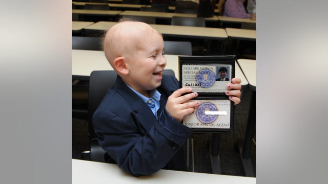 FBI Houston: Young boy living with brain cancer sworn-in as honorary Junior Special Agent
