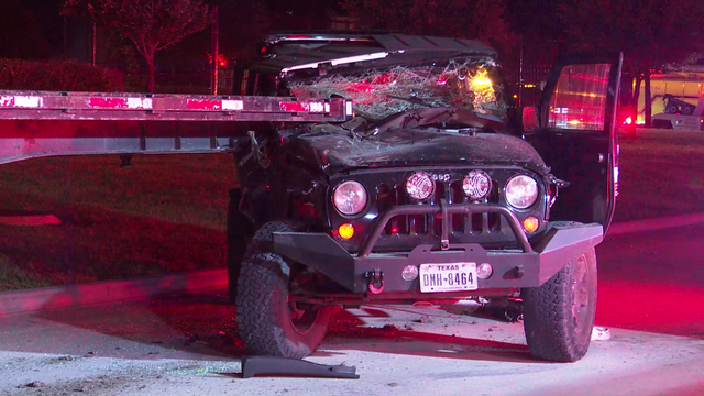 2 trapped after Jeep collides with parked trailer in north Harris County