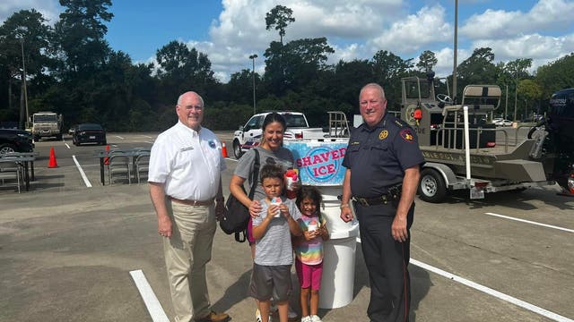 Harris County Constable Mark Herman treats kids to free snow cones