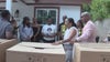 Actors for "Christmas Cover-Up" movie being shot in Houston deliver an early Christmas to Houston residents
