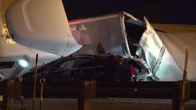 Houston crash: 18-wheeler flips, lands on car on East Freeway