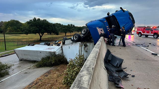 Houston crash: 18-wheeler seen hanging off main lanes near Eastex Freeway