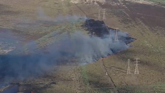 La Porte diesel truck fire spread to nearby marsh, black smoke seen