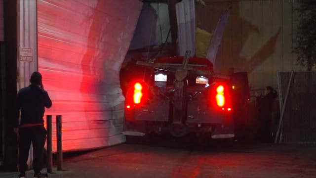 Pics: Tow Truck crashes into auto shop, after collision with car; 1 person hospitalized