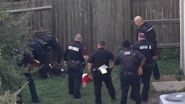 Harris County K-9 seen dragging chase suspect, biting down on his leg