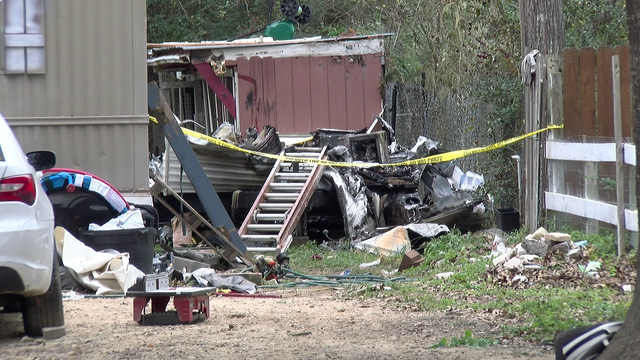 Body discovered in burned travel trailer in Magnolia